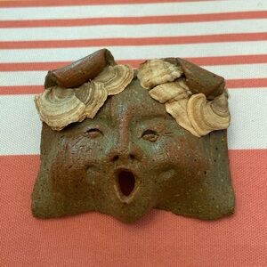 Contemp wood sprite pin/pendant of terra cotta. Tree conk accent. Great face.